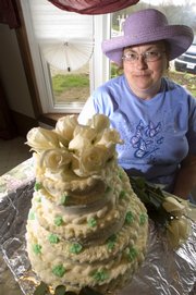 Meri Kelley, of Tonganoxie, has had a lifelong passion for cake decorating, and she has finally gotten the opportunity to make the wedding cake she has always wanted: her own.