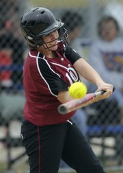 Lawrence High senior Emily Lamb connects against Shawnee Mission Northwest. Lamb and her classmates were honored at Senior Night on Tuesday at Holcom Complex.