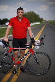 Maj. Brian Rau, a friend of Maj. David Rozelle's, will be competing in the Ironman 70.3 Kansas in June.