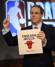 Chicago Bulls executive vice president of business operations Steve Schanwald poses for photographers. The Bulls, which had a 1.7 percent chance of landing the top pick, shockingly won the NBA Draft lottery Tuesday night in Secaucus, N.J.