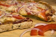 A great tasting gluten-free pizza crust is possible with the right ingredients and technique as seen here in this Thursday, May 8, 2008 photo. The dough, including sorghum and tapioca flours, is prebaked without toppings for 10 minutes before adding whatever favorite topping are desired then finished baking for 20-25 minutes.