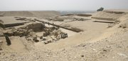 Workers are seen at the site of a so-called "missing" pyramid, currently only a heap of rocks at the bottom of a dugout pit, on Thursday at Saqqara, Egypt. Egypt&squot;s chief archaeologist Zahi Hawass said his team had uncovered the missing pyramid of an ancient Pharaoh who ruled more than 4,000 years ago and a ceremonial procession road where high priests carried mummified remains of sacred bulls worshipped in Memphis, the capital of Egypt&squot;s Old Kingdom.