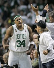 Boston's Paul Pierce (34) celebrates after hitting a three-point shot in the third quarter. The Celtics defeated the Lakers, 98-88, in Game 1 of the NBA finals on Thursday in Boston.