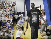 Julian wright, Former KU basketball player and current forward for the New Orleans Hornets, is introduced at the Bill Self Basketball Camp. Wright made an appearance at the camp in this 2008 file photo.