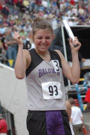 Baldwin's Heather Garcia shows her joy after crossing the finishing line at the state track meet in May.