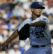 Kansas City starter Gil Meche pitches to a San Francisco Giants batter during the second inning of the Royals' 5-3 victory over the Giants Saturday at Kauffman Stadium in Kansas City, Mo.