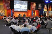 Kansas University men's basketball coach Bill Self holds court Tuesday at a luncheon at the College Basketball Experience in Kansas City, Mo.