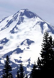 The Hotlum glacier is seen on the northeast face of Mount Shasta in June. While global warming is causing the retreat of glaciers in the Sierra Nevada, Cascade and Rocky mountain ranges, the seven glaciers on Mount Shasta are growing.
