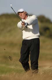 Greg Norman plays on the 15th hole during the third round of the British Open. Norman, who hasn't won a major in 15 years, held a two-shot lead over defending champion Padraig Harrington and K.J. Choi after Saturday's round at the Royal Birkdale Golf Course in Southport, England.