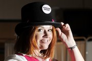 Lisa Covington, a breast cancer survivor, sports a top hat Saturday at Lawrence Memorial Hospital, location of the Betsy Beisecker Memorial Tea. The 10th annual event was free, although tickets were required.