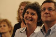 Nancy Thellman, left, and her husband, Scott, watch primary results come in at the Douglas County Courthouse. Thellman defeated Ken Adkinson in the Democratic race for the 2nd District County Commission seat.