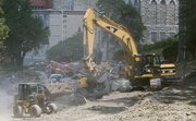 A construction crew works on replacing the maintenance tunnels that run throughout the Kansas University campus. KU has millions of dollars worth of maintenance needs on its Lawrence campus and can offer tax credits to donors who put up funds for repairs.