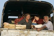 Georgian refugees Flee Monday from Gori, Georgia. Russian armored vehicles rolled deep into central and western Georgia on Monday, quickly taking control of a key city, several towns and a military base, according to Georgian officials and witnesses. The reported capture of the key Georgian city of Gori and the towns of Senaki, Zugdidi and Kurga came despite a top Russian general's claim earlier Monday that Russia had no plans to enter Georgian territory.