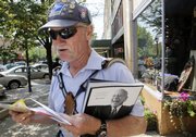 Jerry Totten makes his mail deliveries Tuesday, to addresses along Massachusetts Street. His route is Massachusetts and New Hampshire streets from the 600 to 1100 blocks.