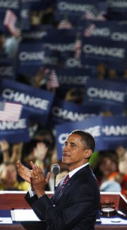 Democratic presidential nominee Sen. Barack Obama, D-Ill., applauds before giving his acceptance speech Thursday at the Democratic National Convention in Denver.