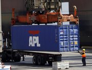 A longshoreman readies a container for shipment Thursday at the APL Terminal at the Port of Los Angeles. The economy pulled out of a dangerous rough patch in the spring, thanks largely to strong exports, but the rebound isn't expected to last. Economic slowdowns overseas could make exports tail off just as Americans are hunkering down after the bracing impact of rebate checks wanes.