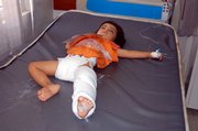 Four-year-old Muntazer Ahmed, who was wounded in a suicide bomb attack, is treated Saturday at a hospital in Dahuk, 260 miles northwest of Baghdad. At least six people were killed and about 50 were injured Saturday - including 19 in critical condition - when a suicide bomber attacked a market in Tal Afar, about 260 miles northwest of Baghdad, police and medical officials said.