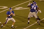 Jeff Spikes (74) blocks for KU quarterback Todd Reesing in the Jayhawks' Aug. 30 home victory against Florida International. Spikes will have his hands full on Friday against South Florida defensive end George Selvie.