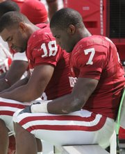 Oklahoma tight end Jermaine Gresham (18) and running back DeMarco Murray bum after the Longhorns' 45-35 victory over OU Saturday in Dallas.
