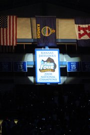 The Jayhawk's 2008 National Championship banner is unveiled Friday, Oct. 17, 2008 during Late Night in the Phog at Allen Fieldhouse.