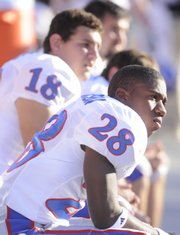 Kansas receiver-turned-cornerback Daymond Patterson (28) watches the waning moments of the Jayhawks' loss to Oklahoma in this file photo from Oct. 18.
