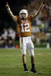 Texas' Colt McCoy (pictured), Oklahoma's Sam Bradford and Missouri's Chase Daniel are part of the new wave of Big 12 quarterbacks who have taken the conference's offenses to a new level. Coaches said the days of lockdown defenses in the conference could be gone for good.