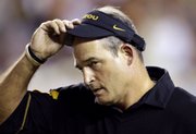 Missouri coach Gary Pinkel walks off the field at halftime during the Tigers' game at Texas. MU fell to the Longhorns Saturday in Austin, Texas, for its second consecutive loss.