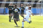 Kansas University junior Estelle Johnson, right, rears back for a kick. The Jayhawks edged Baylor, 1-0, Sunday at the Jayhawk Soccer Complex.