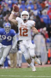 Colt McCoy looks to pass against the Jayhawks in the second half. McCoy led the Texas Longhorns to a 35-7 win over Kansas at Memorial Stadium on Nov 15, 2008