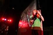 Brian Loux, 14, competes on stage during the final round of competition during Friday night's Guitar Hero battle at Liberty Hall. Loux won the competition, which began with about 30 contestants. The event, sponsored by the United Way and the Boys and Girls Club, raised about $450 for the United Way, according to event organizers.
