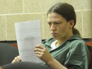 Barbara Jo Schnegelsiepen, 27, Topeka, made her first court appearance on Wednesday, Dec. 3, 2008, via video from the Douglas County Jail, where she is being held on $350,000 bail. Schnegelsiepen faces 11 charges in connection with two residential burglaries Tuesday morning in Lawrence that were followed by a lengthy high-speed chase that extended into rural areas west of town. A Lawrence police officer was injured when he was struck by the fleeing vehicle.