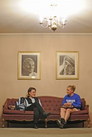 From left, Sister Elena Morcelli talks with Kansas University senior Rachel Schieber, of Kansas City, Mo., at the St. Lawrence Catholic Center.