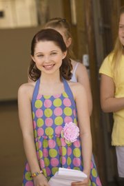 Actress Sammi Hanrattyas “Chrissa,” is shown in this undated photo during a scene from “An American Girl: Chrissa Stands Strong”. Hanratty, who has appeared on TV’s “Pushing Daisies” and “The Suite Life of Zac and Cody,” brings Chrissa to life on screen in the first American Girl film based on a contemporary character.