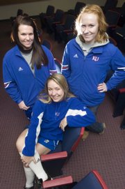 Seniors Elle Pottorf (from left), Dougie McCaulley and Valerie George were some of the KU softball team that met with the media Monday, Jan. 26.