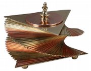 Silver-plated triangular pieces of metal were formed into this 5-3/4-inch-high cigarette box, made by John Otar about 1935. It sold for $1,000 at Talisman Fine Arts of San Francisco at Trocadero.com.