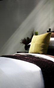 Adding tactile elements to your home, such as soft pillows and throws, helps make it a pleasant retreat.