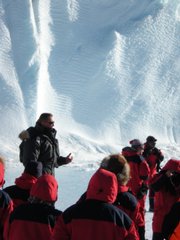 Ken Pedersen, expedition leader at the Norwegian Troll Research Station in Antarctica, briefs a group of visiting environment ministers and other representatives from more than a dozen nations on Monday. The group flew to the remote station to learn from international scientists about whether and how global warming may melt Antarctic ice, raising sea levels.