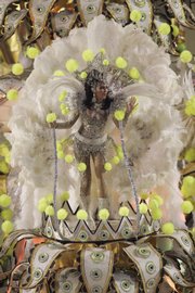 A dancer performs atop an Imperatriz samba school float Tuesday at the Sambadrome in Rio de Janeiro.
