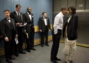 White House photographer Pete Souza especially likes an inauguration night image of the president nuzzling first lady Michelle Obama in a freight elevator while Secret Service agents awkwardly try to avert their eyes.