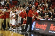 Texas Tech coach Pat Knight receives a handshake at the end of the Red Raiders’ victory over Kansas on March 4, 2009, in Lubbock, Texas.