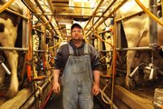 Eugene George says times are worse now for dairy farmers than at any time during his 24-year farming career.
