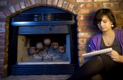 Emily Corliss, Free State High School senior, says she plans on spending her spring break this year working on her new laptop and practicing sketching in preparation for the architecture program at Kansas State University in order to save money for a summer trip to Romania.