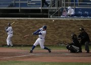 Kansas' James Stanfield fouls off a pitch during the game against Northwestern on Sunday, March 8, 2009, at Hoglund Ballpark.