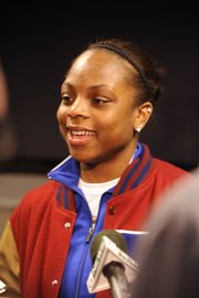 Kansas’ Danielle McCray visits with the media after the Jayhawks learned Monday they were headed to the Women’s NIT.