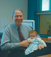 When Tom Mundinger's first grandchild, Mason Thomas Banks, was born just before Christmas, the longtime Baldwin School District principal decided it was time to retire — for good — after 37 years in education. He is the only principal Baldwin Elementary School Intermediate Center has ever known.