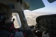Jake Batchelor steers his plane high above Lawrence during a recent flying lesson. Batchelor plans to get his pilot license as soon as he can with the help of his Big Brother, Gail Gribble.