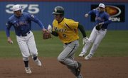 Kansas’ Tony Thompson, left, lines up a throw to first base to end a Baylor threat. KU fell to the Bears, 21-9, Sunday at Hoglund Ballpark. Story on page 1B