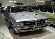 a 1964 Pontiac GTO is shown Sept. 10, 2008, at the General Motors Heritage Center in Sterling Heights, Mich. General Motors announced it is killing off Pontiac, the maker of impressively big and noisy cars that, when it came to being immortalized in song and movies, once outdid everybody else.