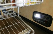 The LaneHawk loss prevention device is shown March 24 at a Kroger store in Gahanna, Ohio. Stores are employing new measures to fight back against rising theft problems during the recession.