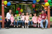 The Gosselin family poses at a party to celebrate the sextuplets’ 5th birthday in this photo released by TLC. Mom Kate is at left and dad Jon on the far right. Some fans of “Jon & Kate Plus 8” say with the couple divorcing, it’s time to end the show.
